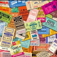 many different colored tickets are scattered together