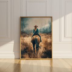 a painting of a woman sitting on top of a horse in a room with white walls