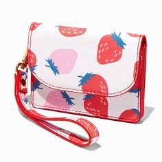 Perfect for accenting your spring and summer looks, this cute wallet is practically bursting with fresh strawberries! Small and compact, it has just enough room for a few cards and some cash. The strap lets you carry it like a wristlet, or you can remove the strap to use it as a regular wallet. Detachable wrist strap Closure: Snap 4W x 3H in. 10.16W x 7.62H cm. Material: PU - Claire's Strawberry Print Wristlet Wallet Cute Red Wallets For Daily Use, Cute Red Wallets For Everyday Use, Trendy Spring Wallets Perfect For Gifts, Playful Wallets With Card Slots, Playful Wallets With Card Slots For Daily Use, Trendy Spring Bags With Card Slots, Trendy Spring Wristlet For Daily Use, Trendy Wallets For Daily Use In Spring, Physical Manifestation