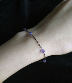 Moonglow. Βeauty and magic in the most delicately dark way. This bracelet is composed of black rhodium over 925 sterling silver delicate sparkling chain, 4mm purple amethyst gemstones. You can choose between these chain lengths: 15 / 16 / 17 / 18 inches Not sure which length to buy? We can add a 1 inch extender chain. Just write a note at checkout! ❈ We send all our items with registered mail. ❉ Due to the organic nature of stones, there might be a slight variation in colour, size and shape. ✺ All items come packaged in a quality velvet pouch ready for gift giving. ✽ If you want to make a special order, just contact us! 90s Jewelry, Gothic Bracelet, Organic Nature, Purple Gems, Gems Bracelet, Black Bracelet, Moon Glow, Black Bracelets, Bracelet Black