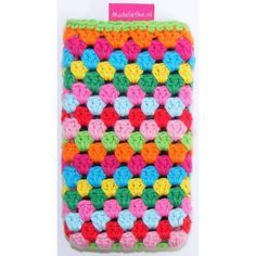 a crocheted dishcloth with multicolored squares on the front and bottom