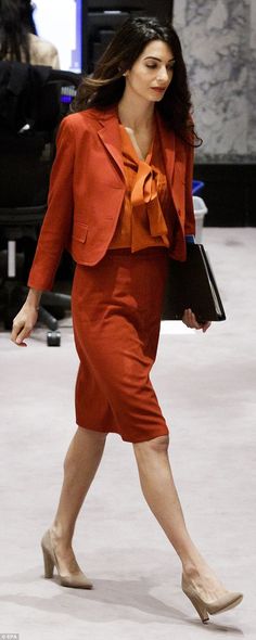 She wore an eye-catching orange suit with a coordinated pussy bow blouse and nude pumps Human Rights Lawyer, Womens Business, Famous Females, Orange Suit, Style Analysis