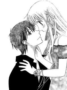 an anime couple kissing each other in black and white