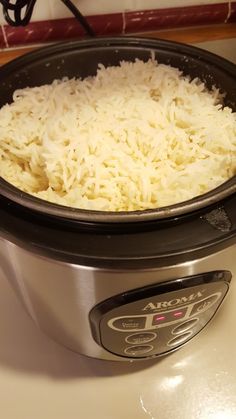 rice is being cooked in an electric pressure cooker