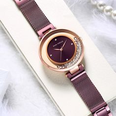 Ladies have a special fascination to flaunt designer fashionable watches. Thus, if you are seeking one such trendy wristwatch for yourself, you have to check out this exclusive designer accessory with a stainless steel band and crystal dial window. The round shape of the case complements its look with absolute perfection.

Specifications
Movement: QUARTZ
Case Material: Alloy
Clasp Type: Hook Buckle
Water Resistance Depth: 3Bar
Style: Fashion & Casual
Feature: Water Resistant
Model Number: MF0254 Trendy Rose Gold Stainless Steel Watches, Rose Gold Metal Watch With Metal Dial, Rose Gold Metal Dial Watch, Ladies Dress Watches, Nursing Books, Wristwatch Fashion, Womens Watches Luxury, Rose Gold Case, Women Watches