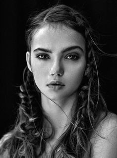 black and white photograph of a woman with long hair