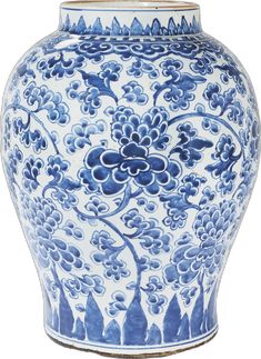 a large blue and white vase with flowers on the bottom, sitting in front of a white background