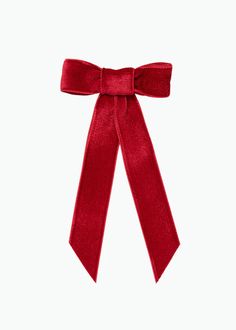 a red velvet bow on a white background with clipping to the side for text