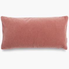 a pink pillow on a white background with a light brown corded back and side