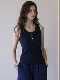 This is a minimal and feminine top by Tillber that is made out of high quality and sturdy material. With distinctive mood of the design and comfortable wear, you can style it for your casual daily outfit.- Deep U neckline- Bamboo fabric ribbing detail- Real sea shell button- Minimal and feminine mood Solid Color Tops With Button Closure For Loungewear, Tops With Button Closure For Loungewear, Stretch Tops With Button Closure For Loungewear, Versatile Cotton Tops With Buttons, Stretch Tops With Buttons For Loungewear, Casual Navy Tops For Loungewear, Navy Casual Tops For Work, Casual Navy Tops For Work, Navy Stretch Top For Workwear