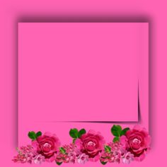 a pink card with flowers and leaves on the bottom right corner is an empty sheet of paper