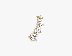 Made with lab grown diamonds and 14k solid gold, this earring is designed to be worn solo as a statement of individuality. Shop VRAI earrings. Jewellery Showroom, Ear Climber, Solid Gold Earrings, Tiny Diamond, Bezel Diamond, Accessories Jewelry Earrings, Cuff Earrings, Diamond Sizes, Elegant Earrings