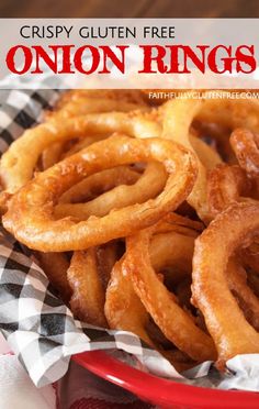 crispy gluten free onion rings in a red bowl on a checkered napkin