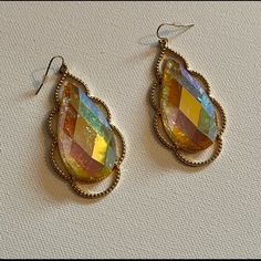 Gold Tone Dangle Earrings With Iridescent Gold Tone Teardrop Shaped Jewels. Has Shades Of Pink, Green, Blue, And Amber When They Catch The Light. Costume Jewelry. Boho, Glam. Never Worn. Iridescent Drop Earrings, Elegant Iridescent Teardrop Earrings, Elegant Multicolor Teardrop Earrings, Rainbow Teardrop Jewelry For Party, Iridescent Teardrop Crystal Earrings, Christmas Present Bow, Light Costume, Cute Christmas Presents, True Autumn