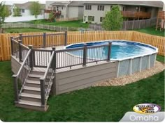 an above ground swimming pool with steps leading up to the deck and above ground hot tub