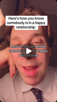 a man in a shirt and tie has his hand on his face with the caption here's how you know somebody is in a happy relationship