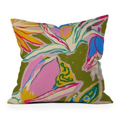 a colorful pillow with an abstract design on the front and back side, sitting on a white surface