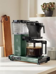 a coffee maker sitting on top of a counter