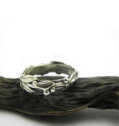 Silver twig stack ring, olive branch stacking ring in sterling silver size 5 , 5,5 - 6 - 10 Olive tree branch band ring in sterling silver . All around the band of the ring are small leaves and granules as olives cast in sterling silver. It is 5 mm wide and is lovely by itself but also nice stack with others. This ring at the pictures is US size 5.5 . I have ready size 5.5, 6 and 10 and you can select them from the sizes menu. Any other size can be done in a couple of days , so If you need anoth Olive Tree Branch, Stack Ring, Small Leaf, Olive Branch, Sterling Silver Bands, Stacking Ring, Stackable Rings, Stacking Rings, Silver Band