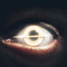 an eye with light coming out of it