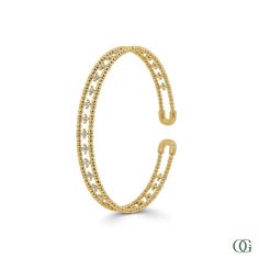 Introducing the stunning Dainty Elegant Bangle featuring 0.62 carats of sparkling diamonds. This sophisticated bangle adds a touch of luxury and elegance to any outfit. With its delicate design and high-quality diamonds, you're sure to make a statement. Elevate your style with the Dainty Elegant Bangle. Elegant Diamond Cut Bangle, Elegant 14k Gold Bracelets With Pave Setting, Elegant Diamond Cuff Bracelet With Accents, Elegant Hand Set Diamond Bangle, Elegant Yellow Gold Diamond Bangle, Elegant Diamond Cuff Bracelet With Diamond Accents, Elegant 14k Gold Diamond Bracelet With Pave Setting, Elegant Diamond Bangle Bracelet With Pave Setting, Elegant 14k Gold Bangle With Diamond Accents