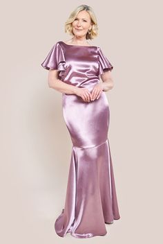 ​Indulge in the epitome of refinement and grace. Our exquisite navy/rose pink satin flutter sleeve mermaid maxi exudes sophistication, meticulously crafted for those with discerning taste. Elevate any special occasion with this stunning creation that drapes luxuriously, casting a mesmerizing silhouette. The lustrous satin fabric adds a touch of opulence, ensuring you stand out at evening soirées, weddings, or as a captivating bridesmaid. With its whimsical flutter sleeves and feminine allure, this dress creates an ethereal aura as you glide through the room. Designed to accentuate your curves flawlessly, it exudes timeless glamour, whether you're gracing a black-tie affair or a lavish cocktail party. The versatility of this gown allows you to personalize your look, ensuring you feel confid Liquid Satin Dress, Satin Design, Satin Clothes, Mermaid Maxi Dress, Liquid Satin, Black Tie Affair, Satin Maxi, Mother Of The Bride Dress, Satin Dress