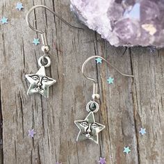 "Cute Star Earrings with Smile Face Star face charm about 1/2\". Star is zinc alloy. Surgical steel ear wires. Your earrings will come in an organza bag to gift or keep for yourself. Bubble wrapped for safe travel. Flat rate shipping no matter how much your order. To view a personalized sun necklace click here: https://www.etsy.com/listing/292929419/sun-initial-birthstone-choker-custom-sun?ref=shop_home_active_3 To view other earrings: https://www.etsy.com/shop/Beadaboutique?ref=ss_profile§ion_i