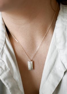 This vertical bar necklace is a classic, easy to gift piece. From the chain to the pendant, this style is made with 14k gold filled or sterling silver pieces, meaning it is built to last. Personalize this necklace with the names, dates, and special words that mean the most to you!  𝗘𝗮𝘀𝘆 𝗧𝗼 𝗦𝘁𝘆𝗹𝗲, 𝗠𝗮𝗱𝗲 𝗧𝗼 𝗟𝗮𝘀𝘁 Our delicate vertical bar necklaces are elegant, perfect for layering, ready to be personalized with your most special sentiments, moments, and memories! Created to las Names Necklace, Sterling Silver Bar Necklace, Bar Necklaces, Vertical Bar Necklace, Bar Necklace Personalized, Silver Bar Necklace, Vertical Bar, Kids Names, Silver Bar