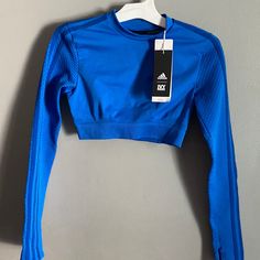 Ivy Park X Adidas Rodeo Collection Long Sleeve Crop Top Glory Blue Size Small. 100% Authentic. Sold Out Gorgeous Top!! Code: 024 Adidas Fitted Long Sleeve Activewear, Adidas Blue Long Sleeve Tops, Blue Adidas Long Sleeve Tops, Adidas Fitted Activewear For Spring, Adidas Blue Activewear For Spring, Adidas Stretch Tops For Gym, Adidas Stretch Long Sleeve Tops, Adidas Tops For Gym In Spring, Adidas Tops For Gym, Spring Season