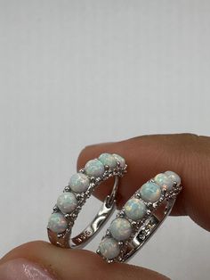 Vintage White Opal Earrings White Sapphire 925 Sterling Silver Hoops
https://www.etsy.com/listing/1614049228/vintage-white-opal-earrings-white White Sterling Silver Hoop Earrings, White Sterling Silver Round Hoop Earrings, White Sterling Silver Hoop Earrings For Anniversary, Anniversary White Sterling Silver Hoop Earrings, White Dangle Hoop Earrings In Fine Jewelry Style, White Hoop Jewelry For Anniversary, White Dangle Jewelry With Prong Setting, White Hoop Earrings For Anniversary, Silver Gemstone Hoop Earrings Fine Jewelry