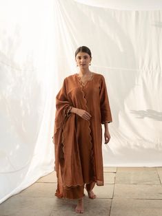 Hand embroidered Kurta pyjama with organza silk dupatta /straight kurta suit set /brown kurta set dupatta USA /rust orange kurta with  dupatta / Indian dresses/ voggish /  chanderi straight kurta dress         Looking for a perfect indian dress/anarkali/suit sets that are trendy, unique and easy to carry !! yess, You are at the right place. we carry such versatile pieces of anarkalis and suit sets that really let you stand out in any occassion !!      featuring this beautiful chanderi silk hand embroidered Kurta set in coffee brown color with round neck and 3/4 sleeves paired matching straight pants and scallop embroidered soft chanderi dupatta as shown !! A very classy, beautiful look makes your occasion Perfect !! Ready to ship !!  Details :  - color :light brown chanderi silk hand embro Brown Dupatta, Indian Dresses Anarkali, Dress Anarkali, Kurta With Dupatta, Coffee Brown Color, Dresses Orange, Orange Suit, Kurta Pyjama, Kurta Dress