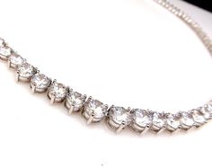 AAA quality clear white cubic zirconia 7mm - 3mm gradation round stones with tarnish resistant high-quality rhodium plated metal setting tennis necklace. Elegant and super flawless sparkling. The necklace measures 15, 16 or 17 inches Available in rose gold and rhodium silver finish. Matching bracelet https://www.etsy.com/listing/85607281/bridal-wedding-bracelet-party-pageant?ref=related-7 Matching earrings https://www.etsy.com/listing/116098279/bridal-earrings-wedding-earrings-bridal?ref=shop_ho Collar Necklace Choker, Bracelet Party, Wedding Bridesmaid Jewelry, Necklace Elegant, Prom Jewelry, Party Necklace, Necklace Wedding, Snap Jewelry, Tennis Necklace