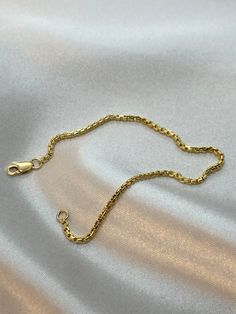 "18K Real Gold Box chain Bracelet ,2mm,7.5\"inches , with  lobster clasp, custom order . Priced to sell! Compare our prices to other similar sellers! Arrives in a GIFT BOX and includes FREE SHIPPING within the USA and Canada. International shipping is available at the most economical rates on ETSY. I HAVE BEEN IN THE JEWELRY BUSINESS ALL MY LIFE. I am a second -generation family member making gold and jewelry. Please feel free to ask me any questions - Always happy to help! Fast Replies to messa Gold Rolo Chain Bracelet As Gift, Gold Rolo Chain Link Bracelet As Gift, Rectangular Yellow Gold Bracelet With Cable Chain, Yellow Gold Box Chain Bracelet As Gift, Gold Bracelet With Rolo Chain As Gift, Gold Bracelet With Rolo Chain For Gift, Gold Bracelets With Rolo Chain As Gift, Gold Rolo Chain Bracelet For Gift, Dainty Yellow Gold Bracelet With Box Chain