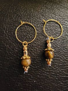 Excited to share the latest addition to my #etsy shop: Tigers Eye Beaded Gold Earrings https://etsy.me/3csz5ME #gold #brown #women #earwire #minimalist #tigerseye #beaded #dangle #drop Round Beaded Earrings With Natural Stones As Gift, Hoop Earrings With Round Natural Stones For Gift, Round Natural Stones Beaded Earrings As Gift, Brown Hypoallergenic Spiritual Jewelry, Hypoallergenic Brown Spiritual Jewelry, Spiritual Brown Hypoallergenic Jewelry, Brown Beaded Hoop Earrings As Gift, Gold Beaded Earrings With Natural Stones, Hypoallergenic Gold Bohemian Beaded Earrings