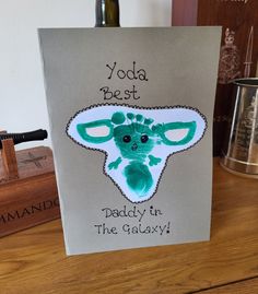 a card with an image of a giraffe on it and the words yoda pie st daddy in the galaxy