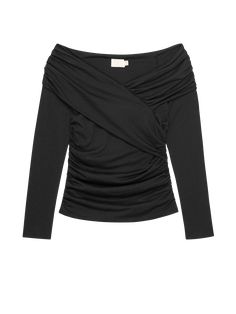 The off-shoulder top of your dreams is here. Crisscross panels, lots of shirring, and the perfect, figure-hugging silhouette. Dinner party, date night, wherever. (This one comes in Jet Black.) | Mika Off Shoulder Top in Jet Black | Ethical Essentials Hugging Silhouette, Perfect Figure, Off Shoulder Top, Off Shoulder Tops, Pima Cotton, Jet Black, Dinner Party, Date Night, Shoulder Top