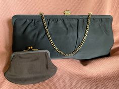 "Vintage black satin Clutch with a small coin purse by After Five by Land M made in USA Gold jeweled clasp with a few jewels missing see picture it's hardly noticeable Gold 4 inch chain tucks inside to carry bag as a clutch Inside is lined in silky fabric Inside pocket Bag measures approximately 11\" x 6\" good size to carry your iPhone and other modern essentials  Item is vintage and in good preowned condition" Vintage Leather Handbag, Woven Leather Bag, Satin Clutch, Small Coin Purse, Silky Fabric, Beaded Handbag, Pocket Bag, Purse Clutch, Carry Bag