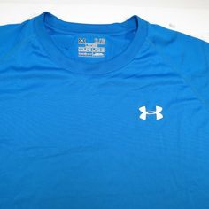 UNDER ARMOUR HEATGEAR GYM WORKOUT ATHLETIC JERSEY TEE T SHIRT Mens XL Blue Size Mens XL    GREAT CONDITION: A couple of tiny snags in shirt as shown.    100% AUTHENTIC QUALITY MADE The shirt measures from armpit to armpit  26" and measures from top to bottom 31" The color is: Blue The fabric content is: 100% Polyester   GQ8 The letters above are for us to locate the item in our collection    There are more large photos of this item at the bottom of the page                 About TheBestStuffEver Blue Crew Neck T-shirt For Gym, Under Armour Sporty T-shirt For Sports, Under Armour Blue Short Sleeve T-shirt, Blue Under Armour Short Sleeve T-shirt, Blue Short Sleeve Under Armour T-shirt, Large Photos, Jersey Tee, Gym Workout, Gym Workouts