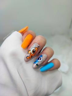 Nemo Nails Disney, Finding Dory Nails, Finding Nemo Nail Art, Moana Nail Designs, Nemo Nail Art, Bluey Cartoon Nail Art, Universal Studios Orlando Nails, Easy Cartoon Nails