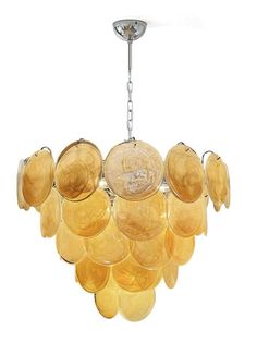 a chandelier made out of yellow glass plates hanging from a ceiling fixture on a white background