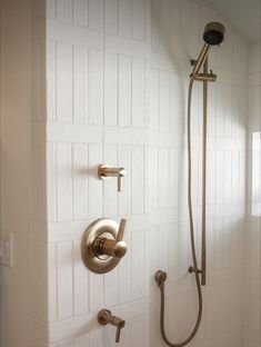 the shower head and handset are connected to the faucet