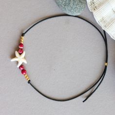 Beautiful Star fish dainty Beach anklet. Perfect for a day at the lake, beach or even just around the house. Just throw it on and you're good to go! Size - One size adjustable. Materials: ☉ Star fish bead & 4 mm red Sea Sediment Turquoises Round Beads ☉ 2.5 mm 24 KT gold plated beads (AG925) ☉ 1 mm thick nylon cord ☉ 24 KT gold plated Slidding bead as closure Packing: ✉ White paper Card designed by me. ✉ Transparent film envelope By shipping, all Anklets are packed in a paper bag and a bubbl Adjustable Dainty Anklet For The Beach, Adjustable Strand Anklet With Starfish Charm, Minimalist Adjustable Anklets For Beach, Minimalist Adjustable Beach Anklets, Handmade Adjustable Starfish Anklet, Adjustable Beaded Bracelet With Starfish Charm As Gift, Dainty Adjustable Friendship Bracelets For Beach, Adjustable Dainty Bracelets For Beach, Adjustable Dainty Bracelet For Beach