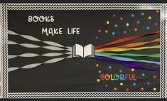 a bulletin board with books made life written on it and colorful streamers coming out of the book