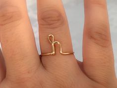 Wire wrapped initial letter h ring. Price is for one ring. Comes in Light pink, Silver, and Gold Adjustable rings, size 7 standard. Please add note at checkout if you would like a certain size. (3-13 us ring sizes) Can be made in Block H the Cursive H or lowercase h. They are formed freehand by me and each one is unique and individualized. They do have some flexibility, so please be careful when wearing them. Please allow 1 to 2 days for your piece to be completed and on its way to you. Packaged Dainty Adjustable Initial Ring With Simple Design, Adjustable Simple Initial Open Ring, Adjustable Monogram Open Ring Jewelry, Cursive H, H Ring, H Initial, Easy Crafts To Sell, Ring Wire, Letter Ring