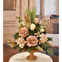 a vase filled with flowers sitting on top of a table