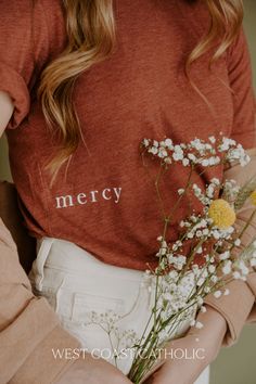 A simple Catholic tee rooted in so much purpose. Shop the Mercy Tee today. Blood In Water, Cute Skirts, Product Photos, How To Feel Beautiful, Cool Shirts, Graphic Tee