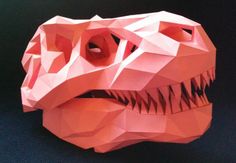 an origami model of a dinosaur's head