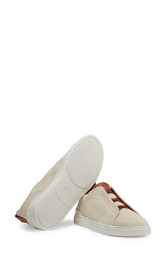 Sturdy cotton-linen canvas frames an iconic sneaker sporting a leather tongue and crisscross elastic laces that offer a sleek profile with easy slip-on comfort. Pull-on style with elastic laces Textile and leather upper/leather lining/synthetic sole Made in Italy Designer Shoes Sporty Canvas Sneakers With Stitched Sole, Canvas Sneakers With Stitched White Sole, Modern Slip-on Sneakers With Gum Sole, Modern High-top Canvas Sneakers With Contrast Sole, White-sole High-top Canvas Slip-on Sneakers, High-top Canvas Slip-on Sneakers With White Sole, Slip-on Low-top Sneakers With Gum Sole, Slip-on Canvas Sneakers With Contrast Sole, High-top Slip-on Sneakers With Perforated Toe Box