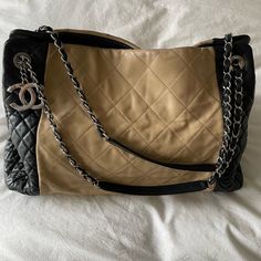 Gorgeous And Classic As Chanel Always Is. Two Tone Beige/Black With Burgundy Cloth Interior. Non Smoker, No Odors. Clean Inside. Light Wear On Top Of One Side Of Bag. Please See Photos. Chanel Medium Flap Bag, Chanel Handbags Black, Chanel Maxi, Chanel Gst, Red Caviar, Chanel Top, Chanel Tote Bag, Chanel Jumbo, Chanel Tote