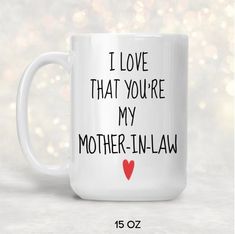 a white coffee mug with the words i love that you're my sister - in - law printed on it